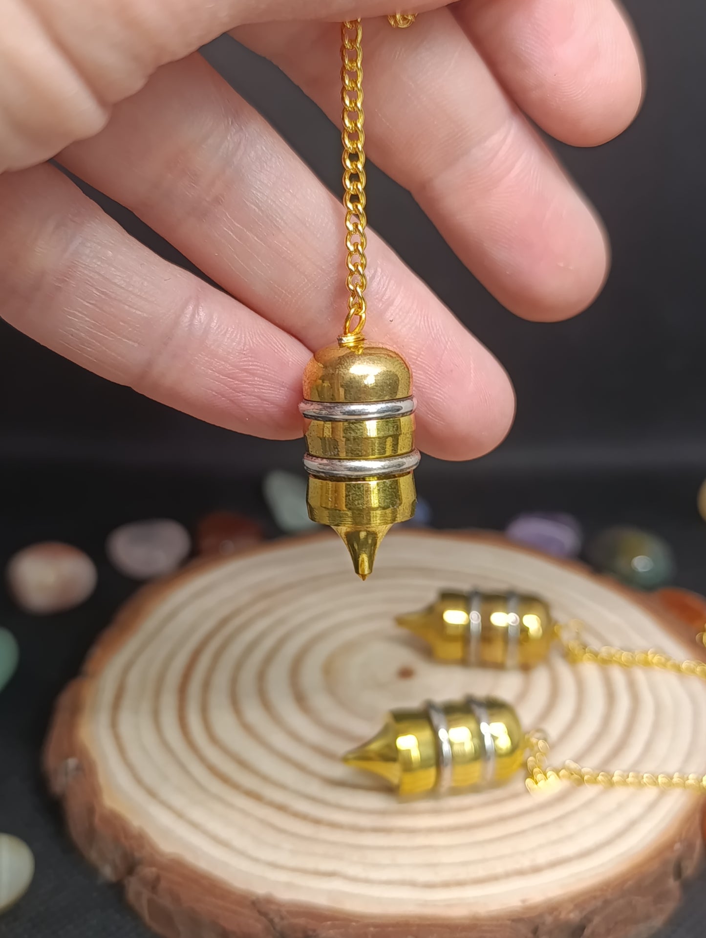 Pendule acier doré