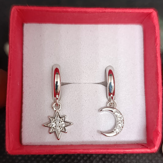 Boucle d'oreille étoile et lune en argent