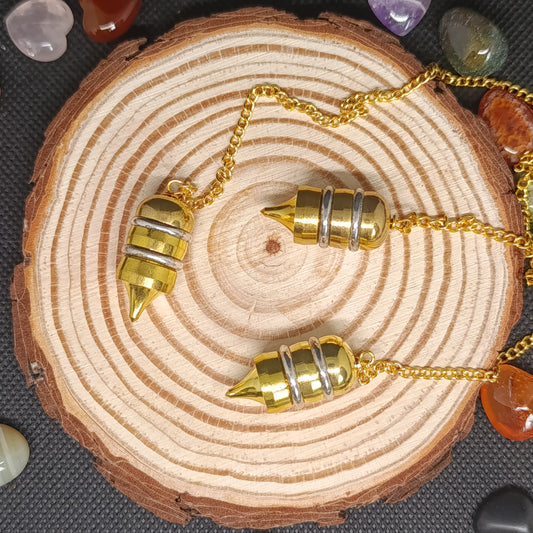 Pendule acier doré
